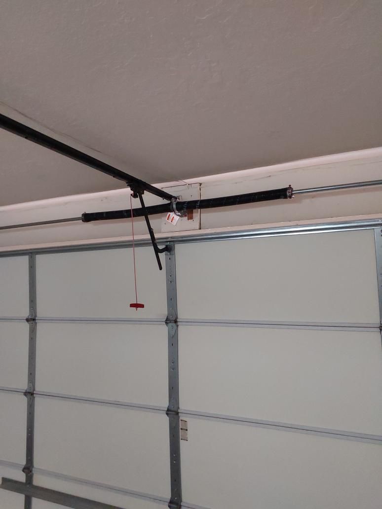 Freshly serviced garage door spring assembly